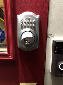A Schlage BE365 we installed on a red door